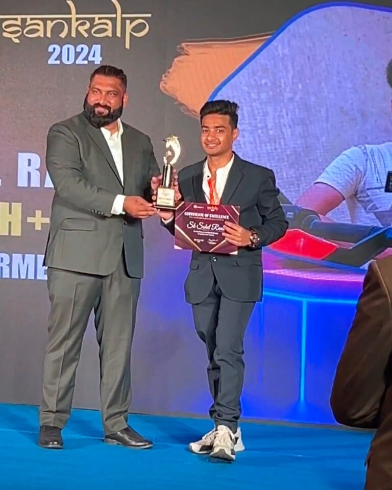 “Receiving the Star Performer Award 2024 on stage — a proud moment of recognition and achievement.”
